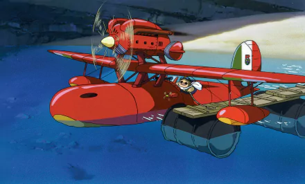 A vibrant HD wallpaper featuring a red seaplane from the anime Porco Rosso, showcasing a character joyfully piloting over shimmering blue waters.