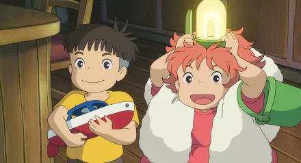 HD desktop wallpaper featuring two animated characters from Ponyo, indoors with a softened warm light.