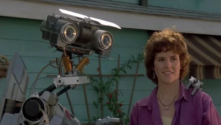 HD wallpaper featuring Stephanie Speck and Johnny 5 from Short Circuit 2.