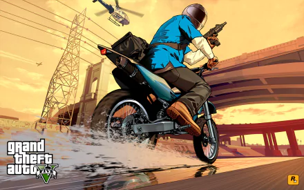 A dynamic HD desktop wallpaper from Grand Theft Auto V, featuring a character on a motorcycle speeding along a road, with a helicopter hovering overhead against a vibrant sunset backdrop.