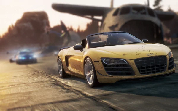 HD PC desktop wallpaper featuring a yellow sports car in a high-speed chase from the video game Need for Speed: Most Wanted (2012).