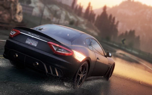 A sleek Maserati speeds along a rain-soaked road, showcasing its dynamic design and power. This HD wallpaper captures the thrill of Need for Speed: Most Wanted (2012).