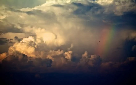  Storm clouds and rainbow