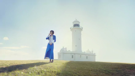 HD PC desktop wallpaper featuring a character from the video game Bioshock Infinite standing near a lighthouse under a bright, clear sky.