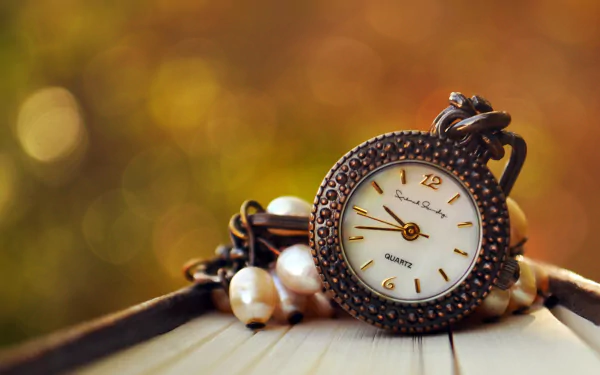 A classy man-made watch featured in an HD desktop wallpaper and background.