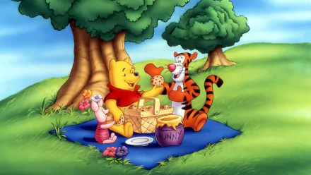 HD wallpaper of Winnie the Pooh, Piglet, and Tigger enjoying a picnic under a tree.