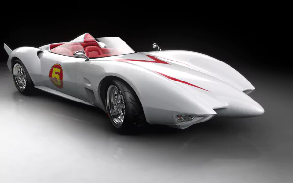 HD PC desktop wallpaper featuring the iconic white Mach 5 racing car from the movie Speed Racer against a dark background.