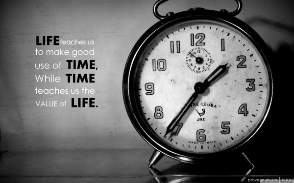 HD desktop wallpaper featuring an antique clock with an inspirational quote on the value of time and life.