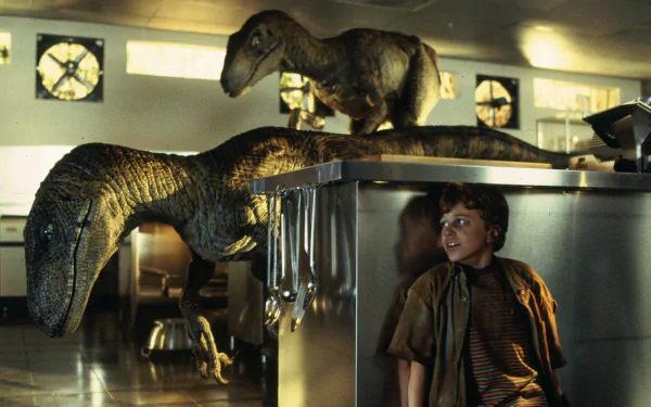 HD wallpaper of a scene from Jurassic Park featuring a Velociraptor in the kitchen with Tim Murphy.