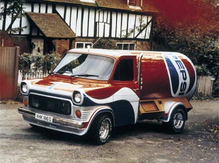 HD PC desktop wallpaper featuring a classic Ford Transit vehicle customized as a Pepsi-branded promotional van parked in front of a traditional English cottage.