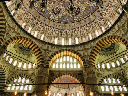 Elegant view of the Selimiye Mosque's stunning ceiling and arches, showcasing intricate patterns and details, captured in high-definition for a captivating desktop wallpaper.