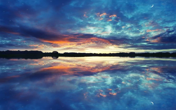 HD desktop wallpaper featuring a vibrant sunset with dramatic clouds reflected over a tranquil lake.