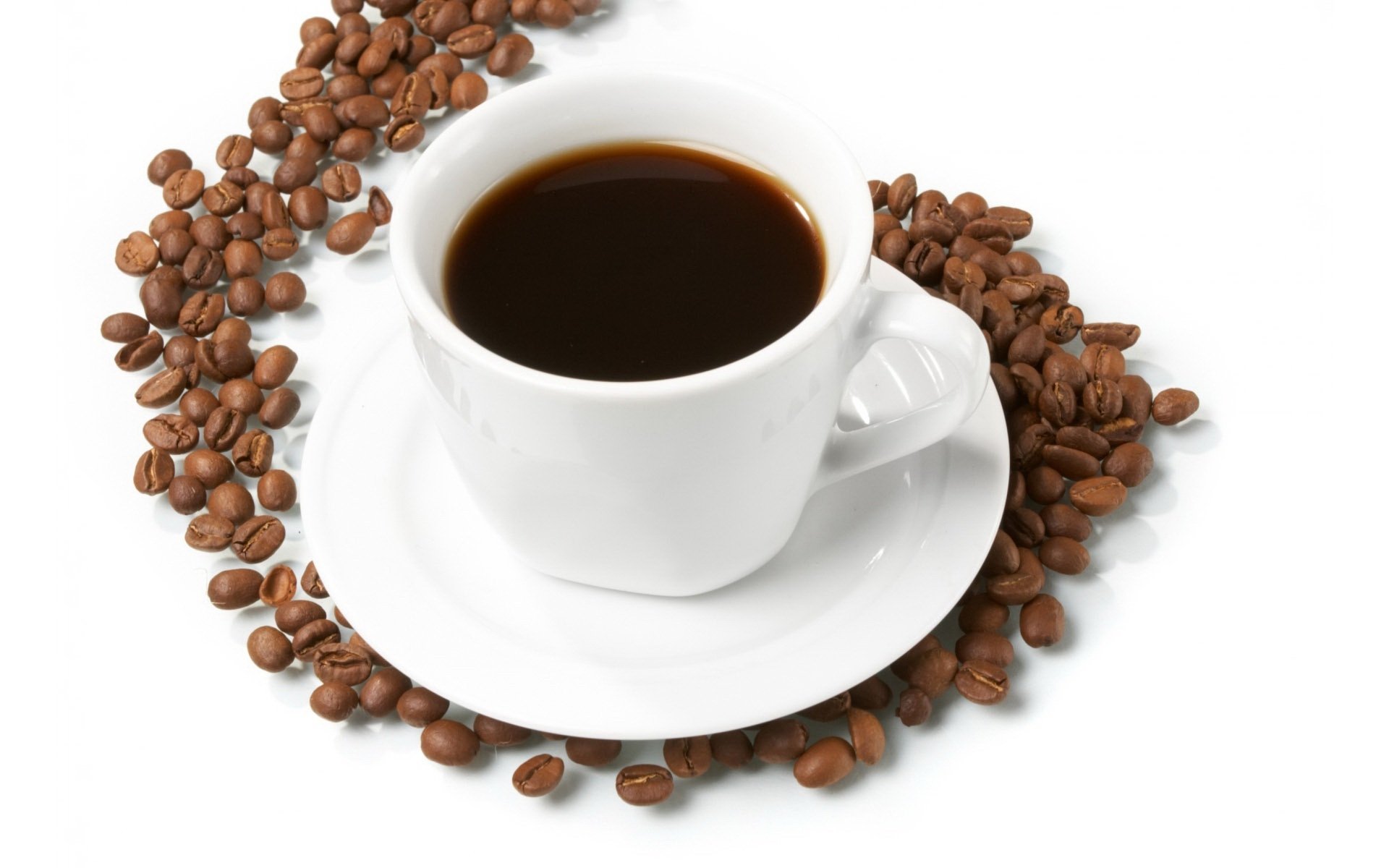 HD desktop wallpaper featuring a white cup of black coffee surrounded by a ring of coffee beans on a white background.