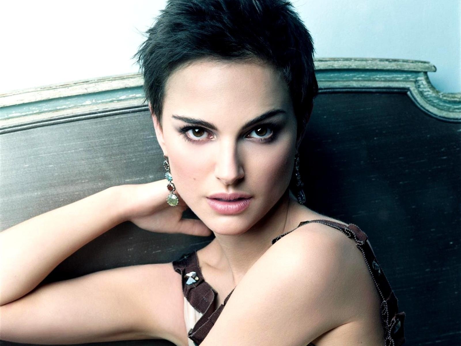 Portrait of Natalie Portman showcasing her striking features and elegant style, serving as a captivating HD desktop wallpaper and background.