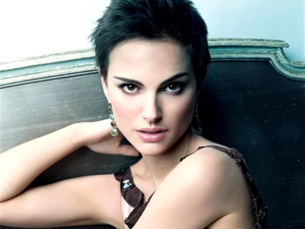 Portrait of Natalie Portman showcasing her striking features and elegant style, serving as a captivating HD desktop wallpaper and background.
