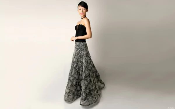 HD desktop wallpaper featuring celebrity Zhang Ziyi in an elegant black lace gown against a light, minimalist background.