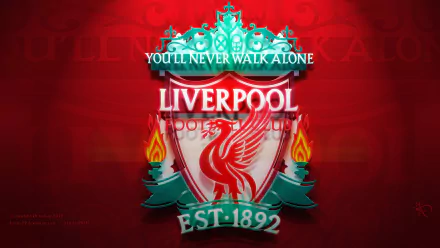 HD desktop wallpaper of Liverpool F.C., featuring their crest with the motto You'll Never Walk Alone on a red background.