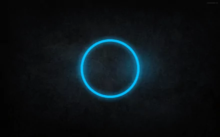 Abstract blue circle on a dark background, creating a modern and sleek design. This HD image serves as a captivating desktop wallpaper and background.
