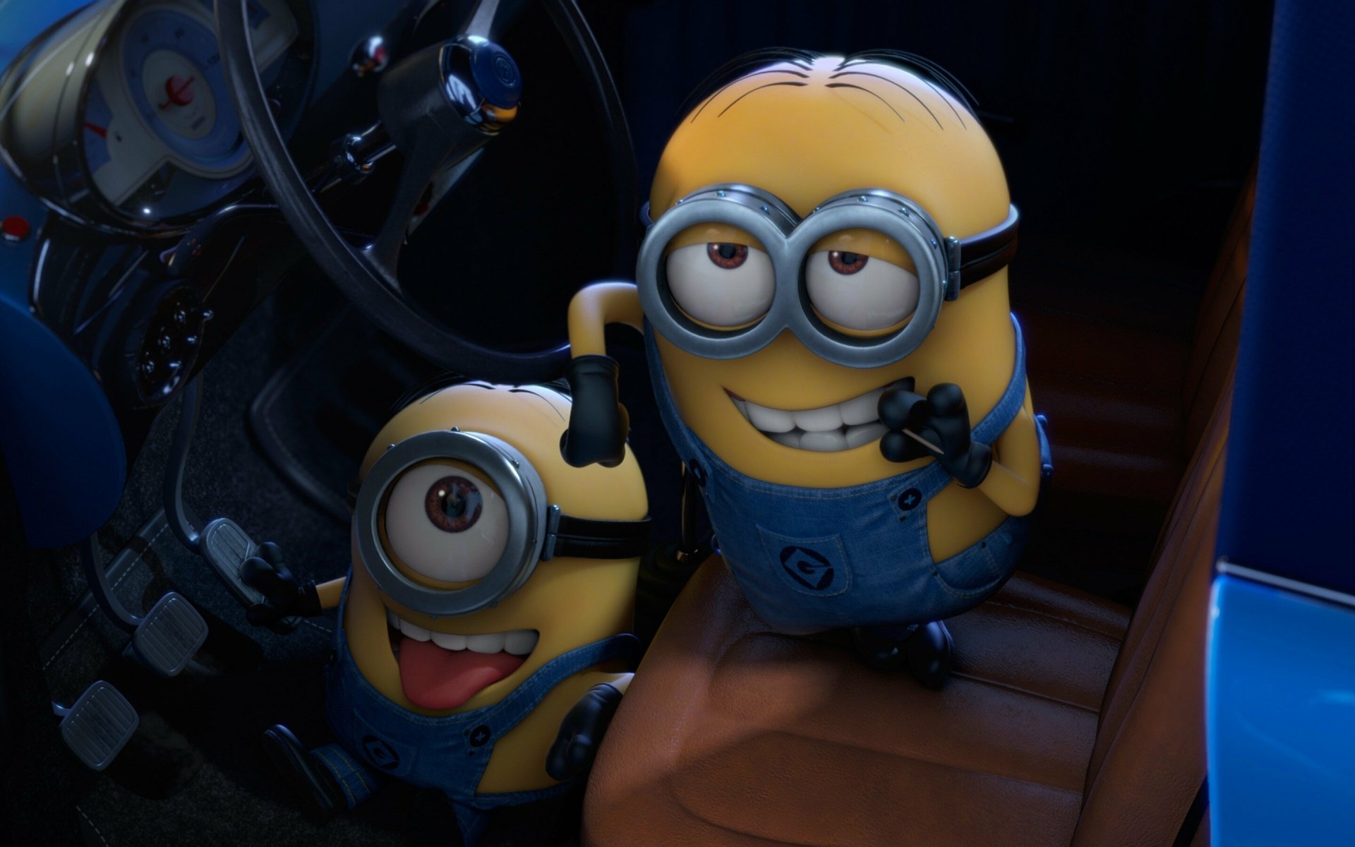 Two cheerful Minions from Despicable Me 2 are playfully sitting in a car, adding a fun and vibrant touch to this HD PC desktop wallpaper and background.