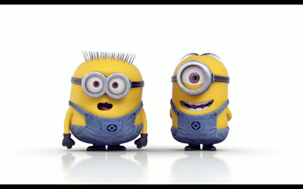 Two yellow Minions from the movie Despicable Me 2, with distinctive features and playful expressions, serve as a vibrant HD PC desktop wallpaper and background.
