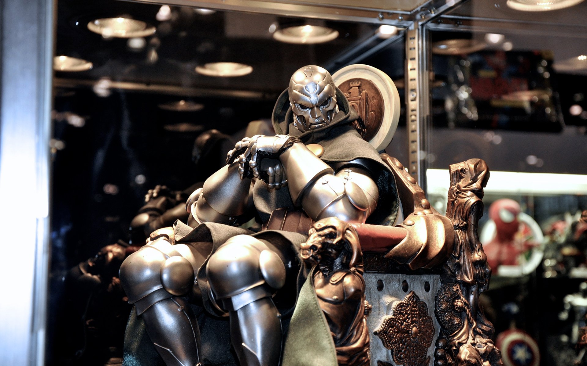 HD PC desktop wallpaper featuring a detailed comic rendition of Doctor Doom seated on an ornate throne with a reflective, dark background.