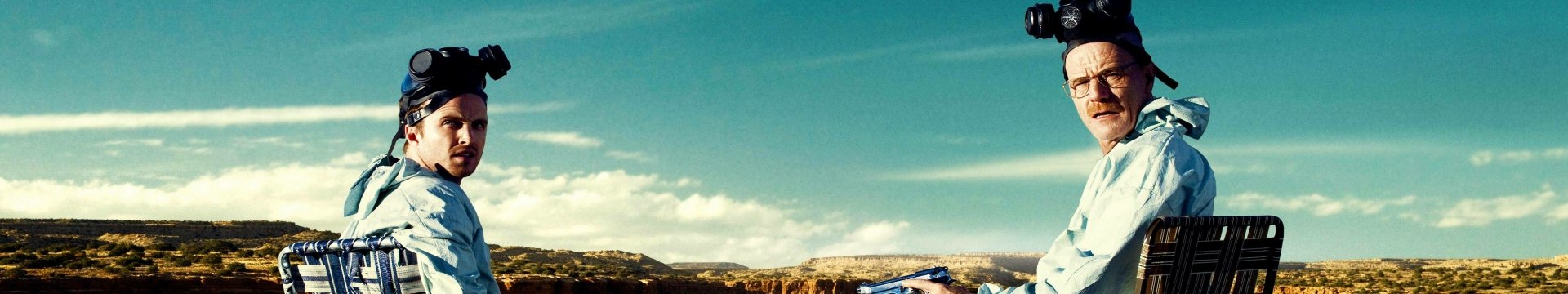 HD desktop wallpaper featuring Aaron Paul as Jesse Pinkman and Bryan Cranston as Walter White from the TV show Breaking Bad against a desert landscape.