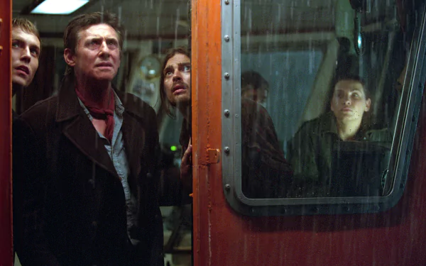 HD movie wallpaper featuring intense characters aboard a ghost ship, captured through a rain-speckled window for a moody, suspenseful atmosphere on a PC desktop background.