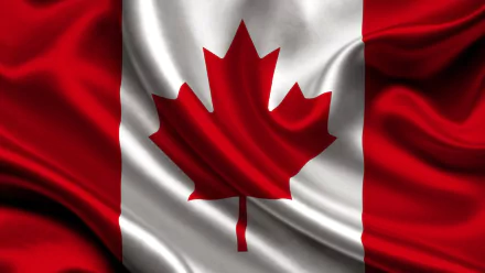 HD desktop wallpaper featuring the flag of Canada, with a red maple leaf set against a white background and red bars on either side.