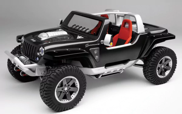 Black Jeep Hurricane with large off-road tires and red seats, showcased as a high-definition PC desktop wallpaper and background.