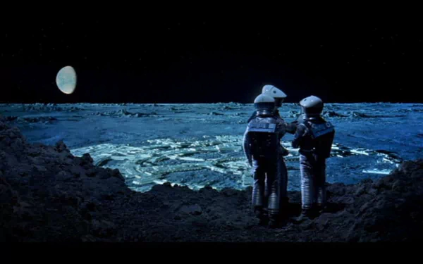 HD desktop wallpaper depicting two astronauts on the moon's surface, inspired by the movie 2001: A Space Odyssey, with Earth visible in the dark sky.