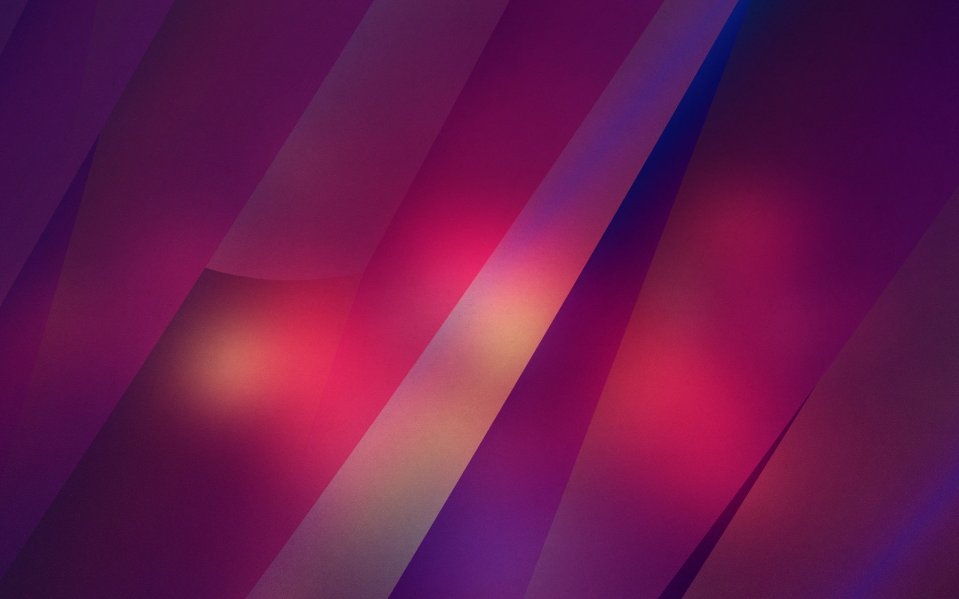 Abstract red and purple geometric shapes create a dynamic, vibrant HD desktop wallpaper with smooth gradients and soft lighting effects.