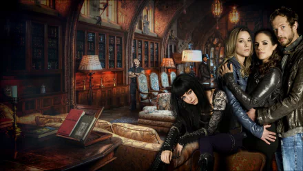 A high-definition wallpaper featuring characters from the TV show Lost Girl, set in an atmospheric library with rich decor, capturing the show's mystical and dramatic essence.