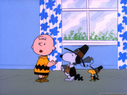 A colorful scene from A Charlie Brown Thanksgiving, featuring Charlie Brown, Snoopy in a Pilgrim hat, and Woodstock, set against a cheerful backdrop with flowers and sunlight.