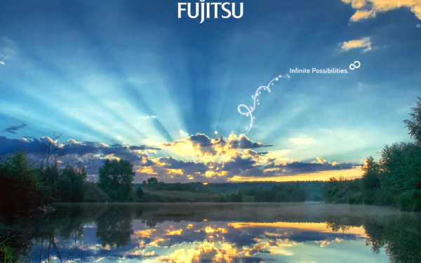 HD PC desktop wallpaper featuring a serene lakeside sunset with rays of light breaking through clouds, branded with Fujitsu technology and the tagline Infinite Possibilities.