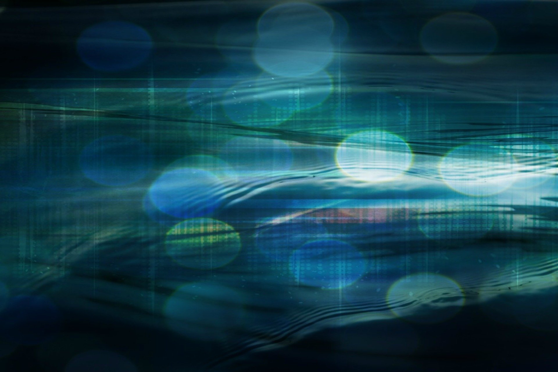Abstract fractal HD PC desktop wallpaper: deep teal-blue waves and luminous bokeh orbs blending into horizontal light streaks over a dark, textured background.