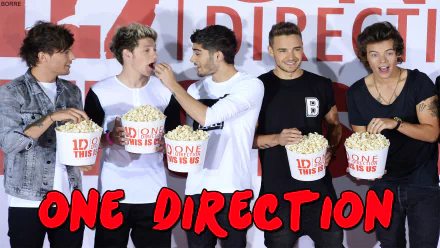 HD desktop wallpaper featuring One Direction members enjoying popcorn with the text ONE DIRECTION in bold red letters at the bottom. Tags: music, One Direction.