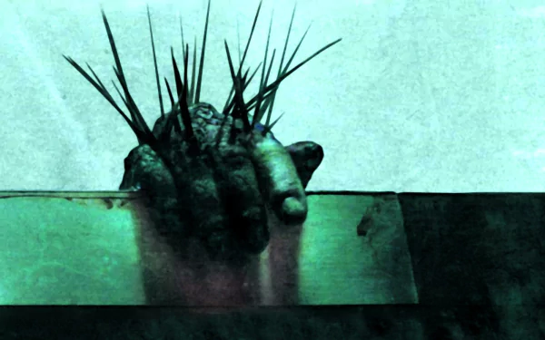 HD PC desktop wallpaper featuring a dark, spiked hand emerging from water, inspired by the horror movie Splinter.
