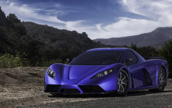 HD PC desktop wallpaper/background: sleek blue Kepler Motion sports vehicle parked on a mountain road beneath dramatic, sweeping clouds.