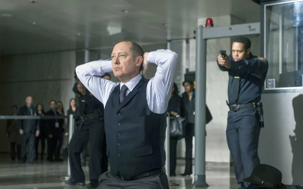 James Spader in a tense scene from the TV show The Blacklist, featured in an HD PC desktop wallpaper and background.