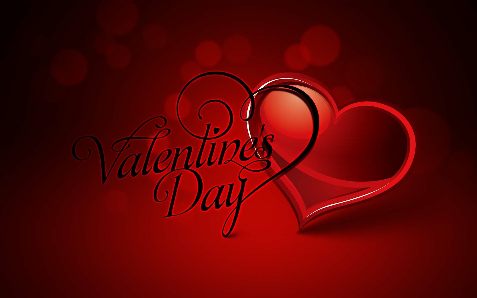 HD PC desktop wallpaper featuring a red heart and elegant Valentine's Day text on a rich red background, capturing the holiday's romantic theme.
