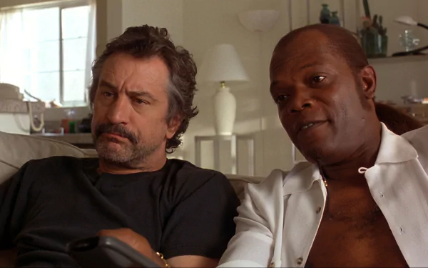 HD desktop wallpaper featuring a still from Jackie Brown with actors Samuel L. Jackson and Robert De Niro.