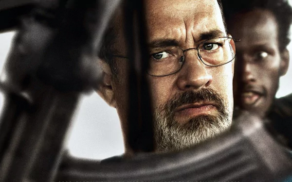 HD wallpaper featuring a character from Captain Phillips, with a focused Tom Hanks in the foreground.