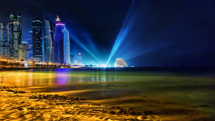 HD desktop wallpaper featuring a vibrant nighttime view of Doha, Qatar. The cityscape glows with colorful lights, reflecting on the water, and dramatic light beams enhance the night sky.