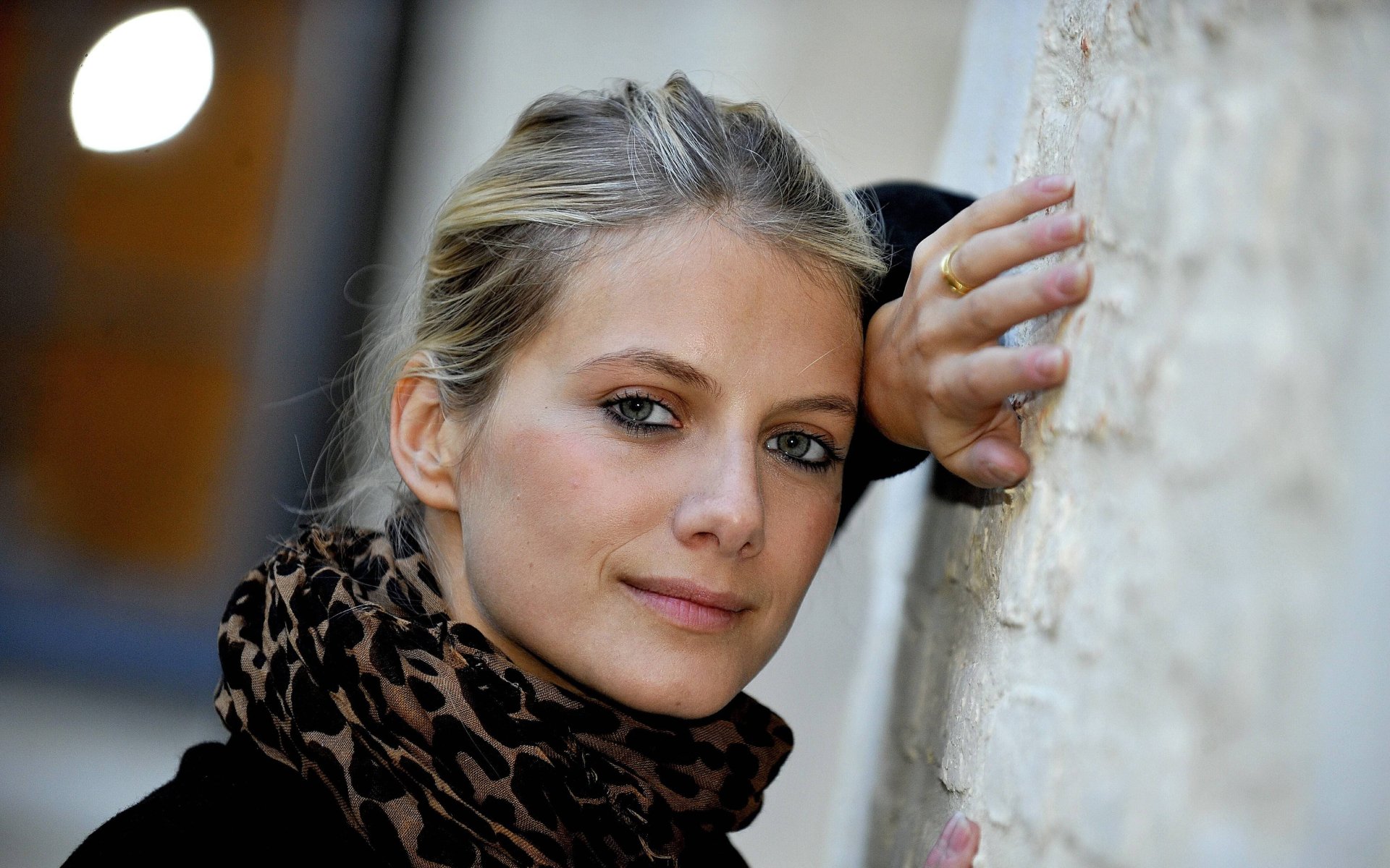 Portrait of French actress and celebrity Melanie Laurent, featured in a 4K Ultra HD PC desktop wallpaper and background.