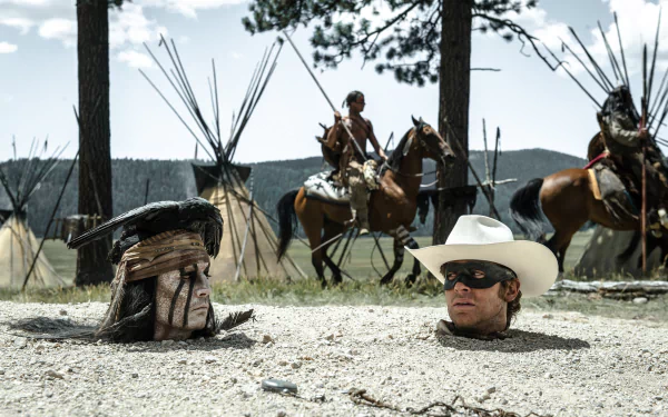 HD desktop wallpaper featuring John Reid buried in sand wearing a white cowboy hat and mask, with Armie Hammer as Tonto on horseback in the background from The Lone Ranger movie.