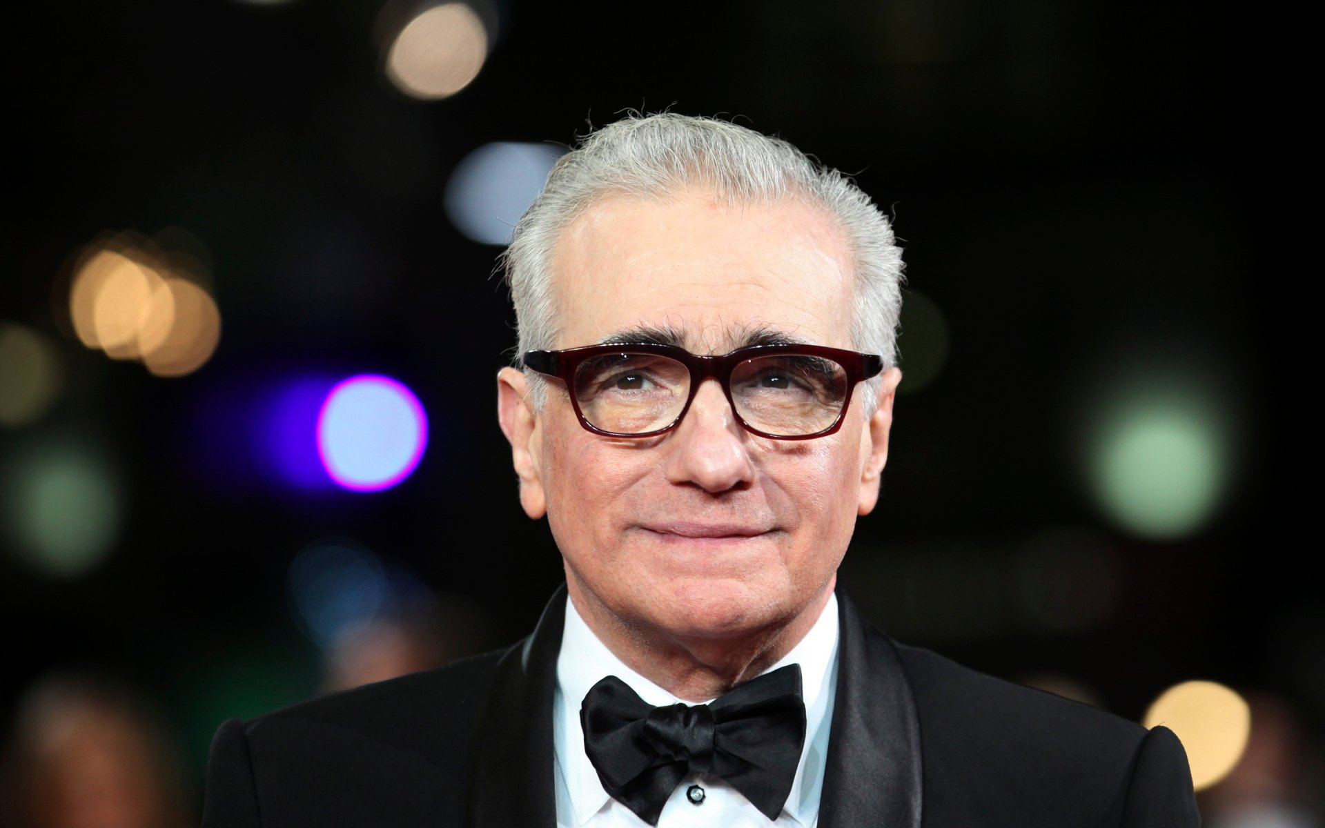 Close-up portrait of American screenwriter and director Martin Scorsese, featured as a HD PC desktop wallpaper and background.