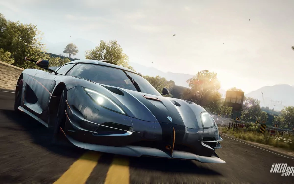 A sleek Koenigsegg One:1 races down a sunlit road in this vibrant HD wallpaper inspired by Need For Speed: Rivals, showcasing the thrill of high-speed gaming.