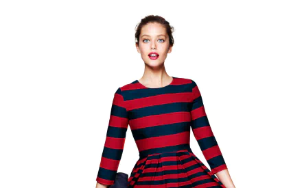 HD desktop wallpaper featuring American model and celebrity Emily Didonato in a red and navy striped dress against a white background.