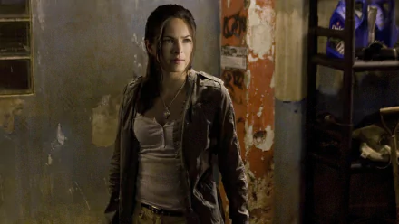 Kristin Kreuk as Chun-Li in a dark, gritty scene from the movie Street Fighter: The Legend of Chun-Li, featured as an HD PC desktop wallpaper.