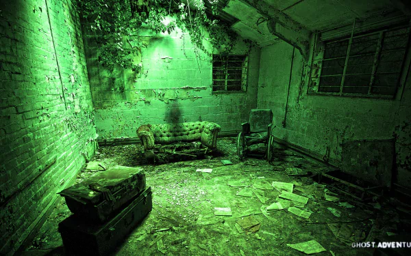 HD PC desktop wallpaper featuring a green-tinted, eerie abandoned room from the TV show Ghost Adventures.
